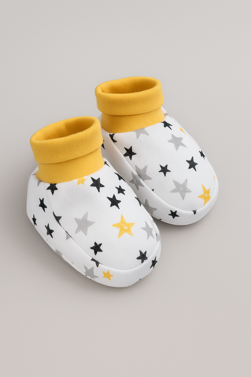 20251111_1228_Starry_Baby_Booties_remix_01k9rwzndnfh8vgkqwz6953n5r.png 3-Pack Cotton Booties | Soft & Cozy Newborn Footwear | Style FN-8536 - Image 1
